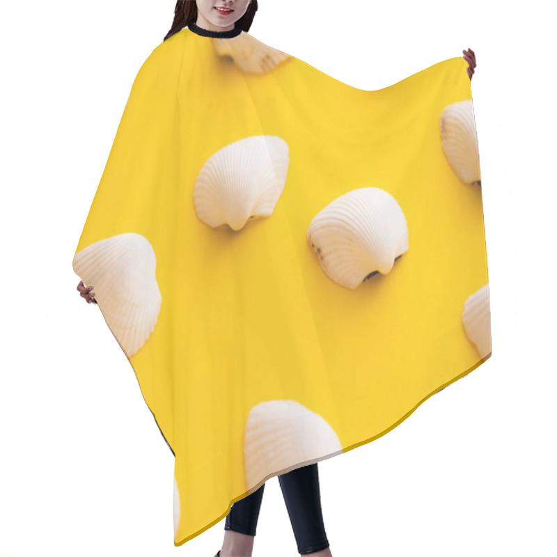 Personality  Close Up View Of White Seashells On Yellow Background  Hair Cutting Cape