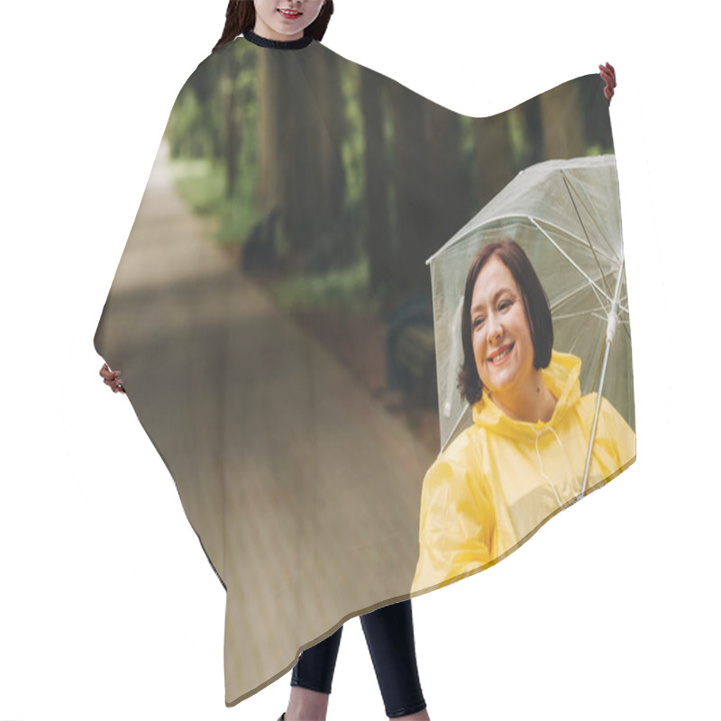 Personality  A Woman In A Yellow Raincoat And An Umbrella Walks In The Park And Garden In Summer. Hair Cutting Cape