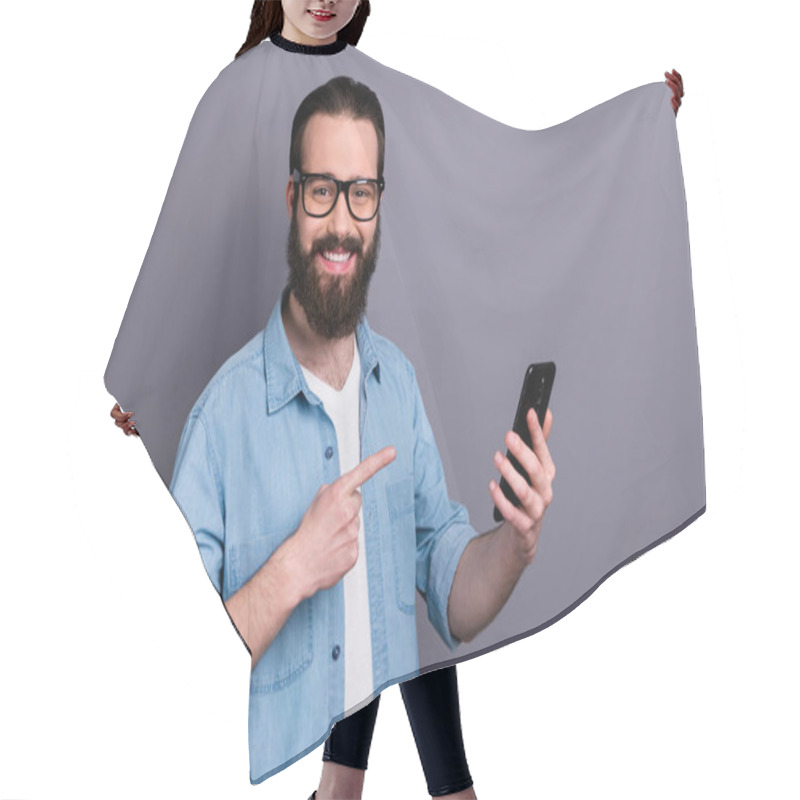 Personality  Portrait Of Positive Cheerful Guy Modern Technology Shop Worker Present New Smartphone Novelty Point Index Finger Wear Good Look Clothes Isolated Over Grey Color Background Hair Cutting Cape