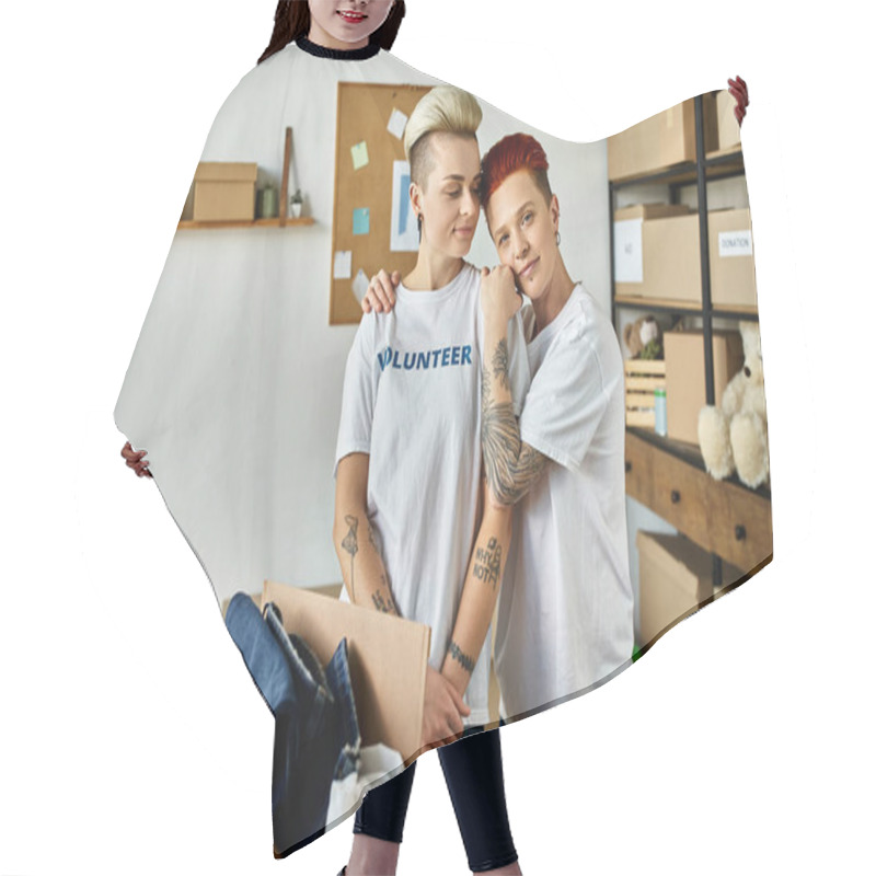 Personality  A Young Lesbian Couple In Volunteer T-shirts Unpacking Boxes, United In Charity Work. Hair Cutting Cape