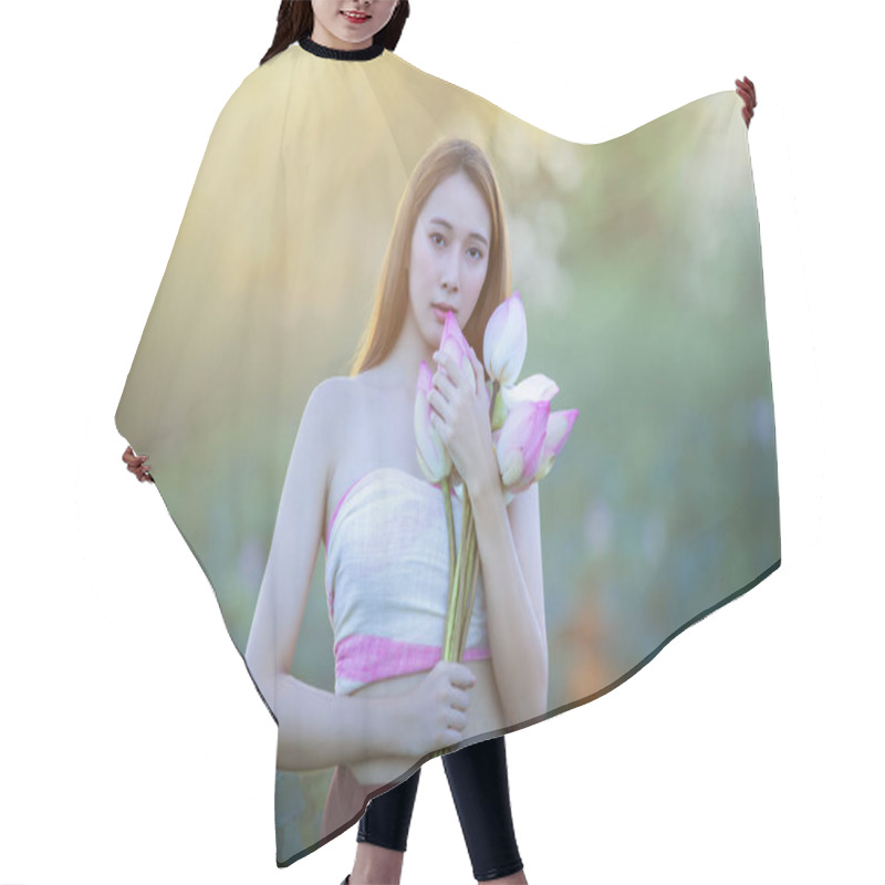 Personality  Picture Of Beautiful Woman With Lotus Flower, Young Beautiful Woman Relaxing With Lotus Flower, The Girl Holds The Lotus Flower In The Field. Hair Cutting Cape