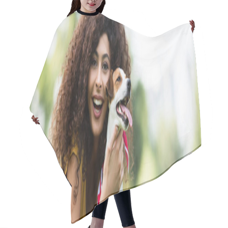 Personality  Panoramic Shot Of Curly Woman Looking At Camera And Laughing While Holding Jack Russell Terrier Dog Hair Cutting Cape