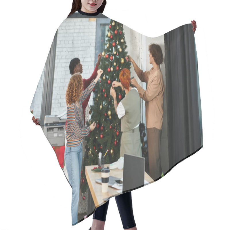 Personality  A Group Of Enthusiastic Coworkers Arrange Ornaments On A Christmas Tree In Their Office. Hair Cutting Cape