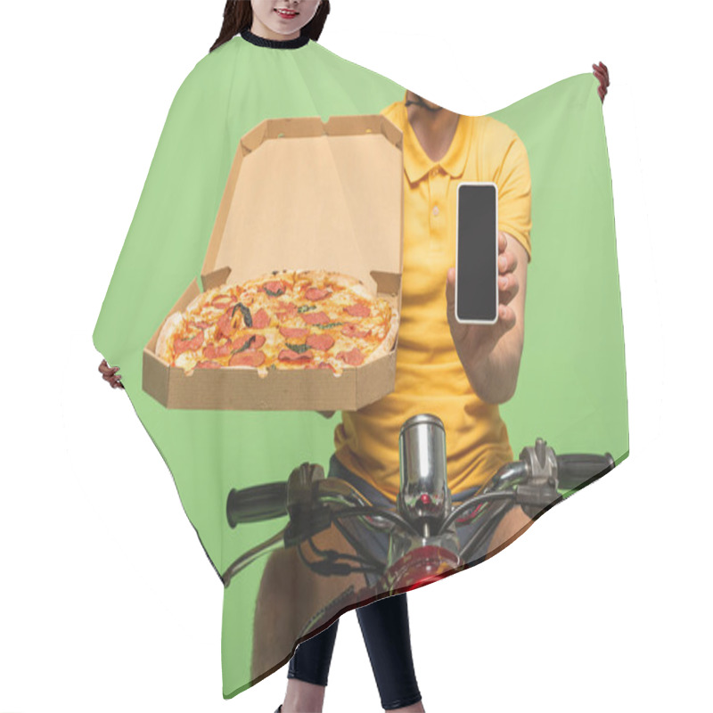 Personality  Cropped View Of Smiling Delivery Man In Yellow Uniform On Scooter With Pizza And Smartphone Isolated On Green Hair Cutting Cape