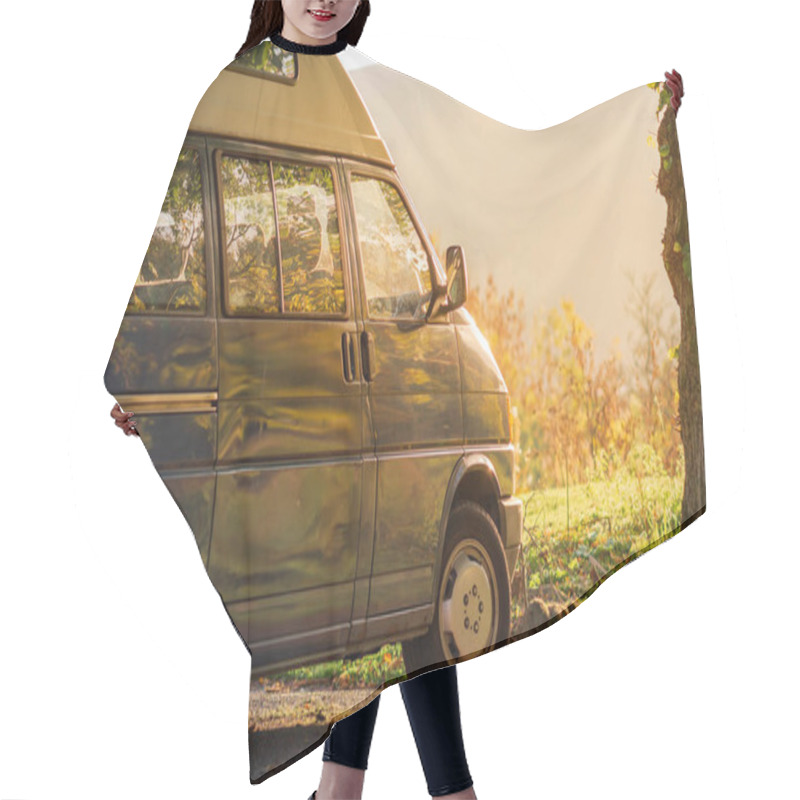 Personality  A Blue Camper Van Sits At Sunset Against A Bright Green Meadow With Lush Orange Sunlight Streaming In Hair Cutting Cape