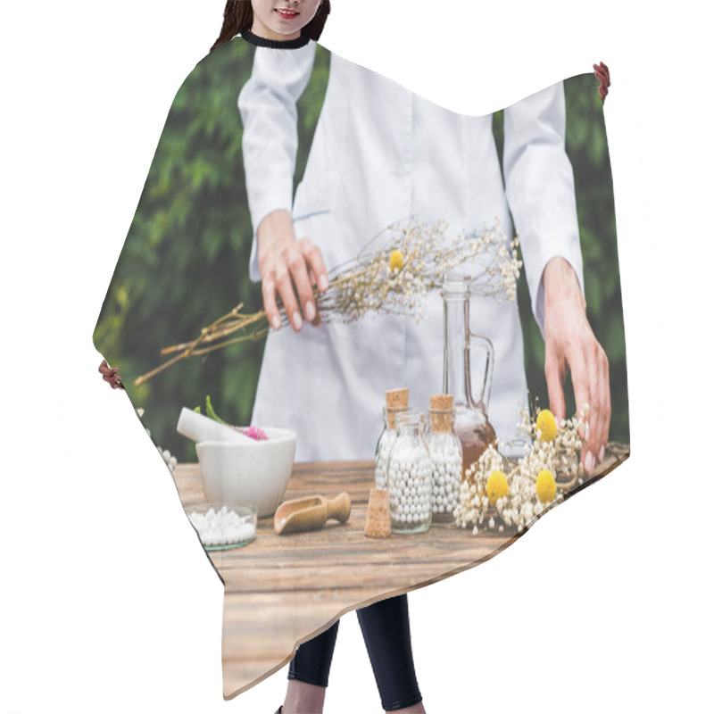 Personality  Cropped View Of Woman Holding Gypsophila Flowers Near Bottles With Pills  Hair Cutting Cape