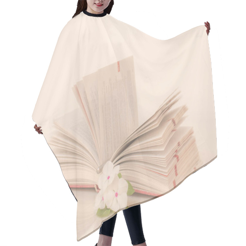 Personality  Open Book With Flowers In The Morning. Hair Cutting Cape