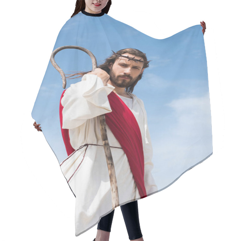 Personality  Low Angle View Of Jesus In Robe, Red Sash And Crown Of Thorns Standing With Wooden Staff In Desert And Looking At Camera Hair Cutting Cape