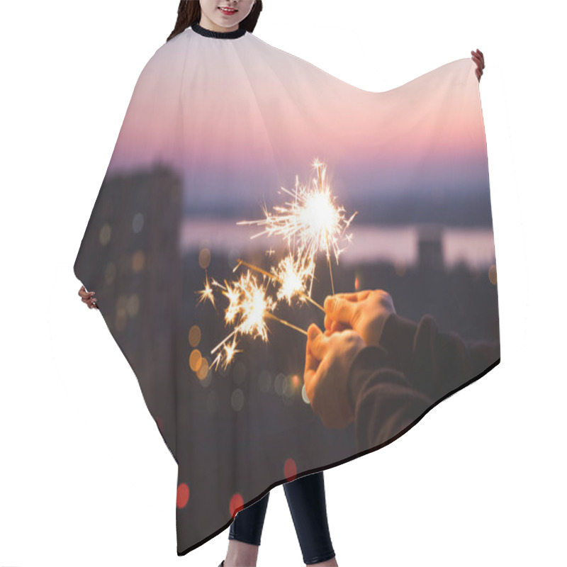 Personality  Hands With Sparkles Bengal Fire That Bokeh Cities Background. Standing In Home. Chelter In Place. End Of A Quarantine. Home Holiday Hair Cutting Cape