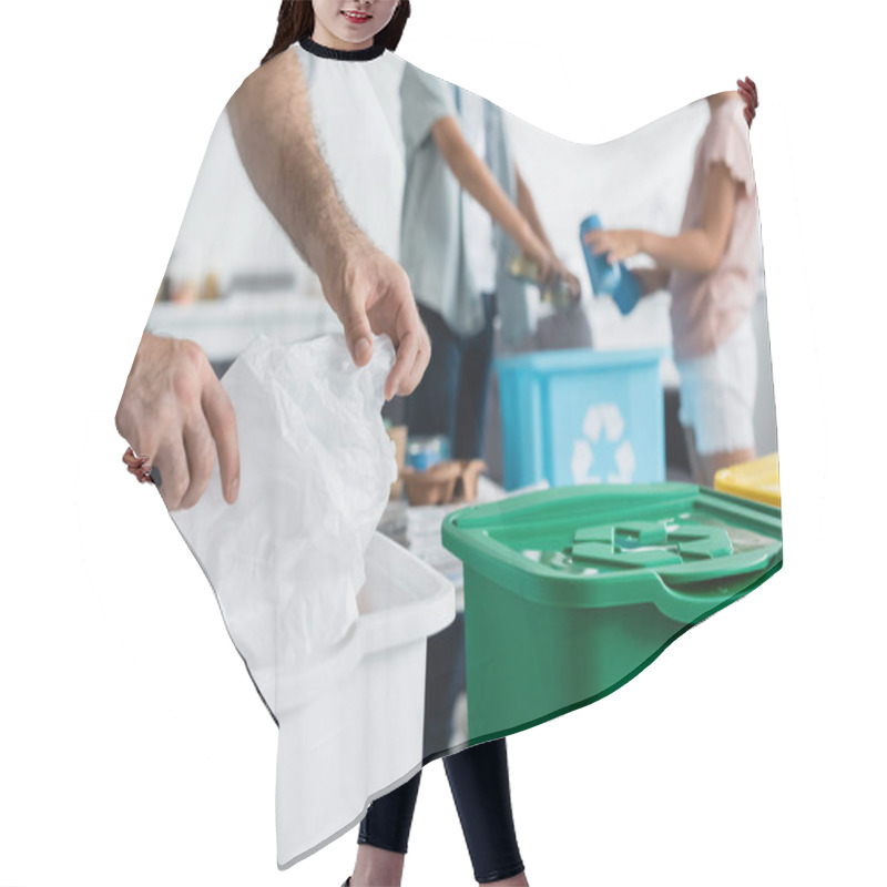 Personality  Cropped View Of Man Holding Plastic Bag Near Blurred Kids And Trash Cans At Home  Hair Cutting Cape