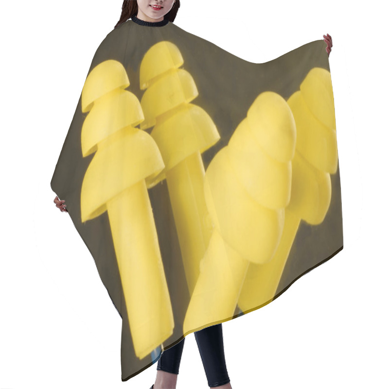 Personality  Yellow Ear Plugs On A Black Background Hair Cutting Cape