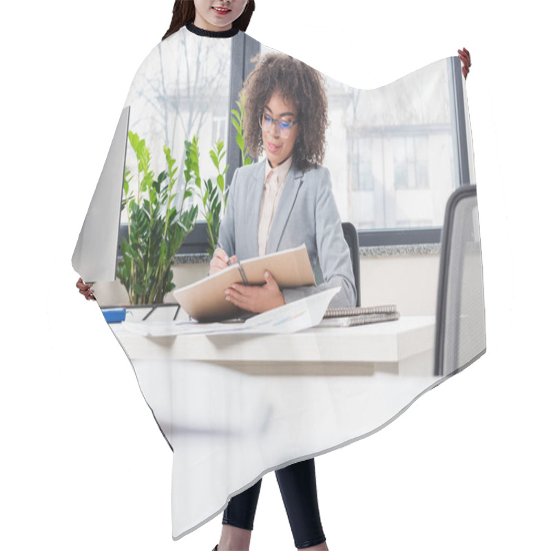 Personality  African American Businesswoman In Glasses At Her Workplace Hair Cutting Cape