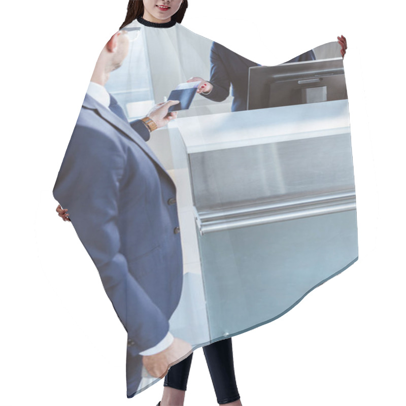 Personality  Businessman Giving Documents To Female Airport Worker At Check-in In Airport Hair Cutting Cape