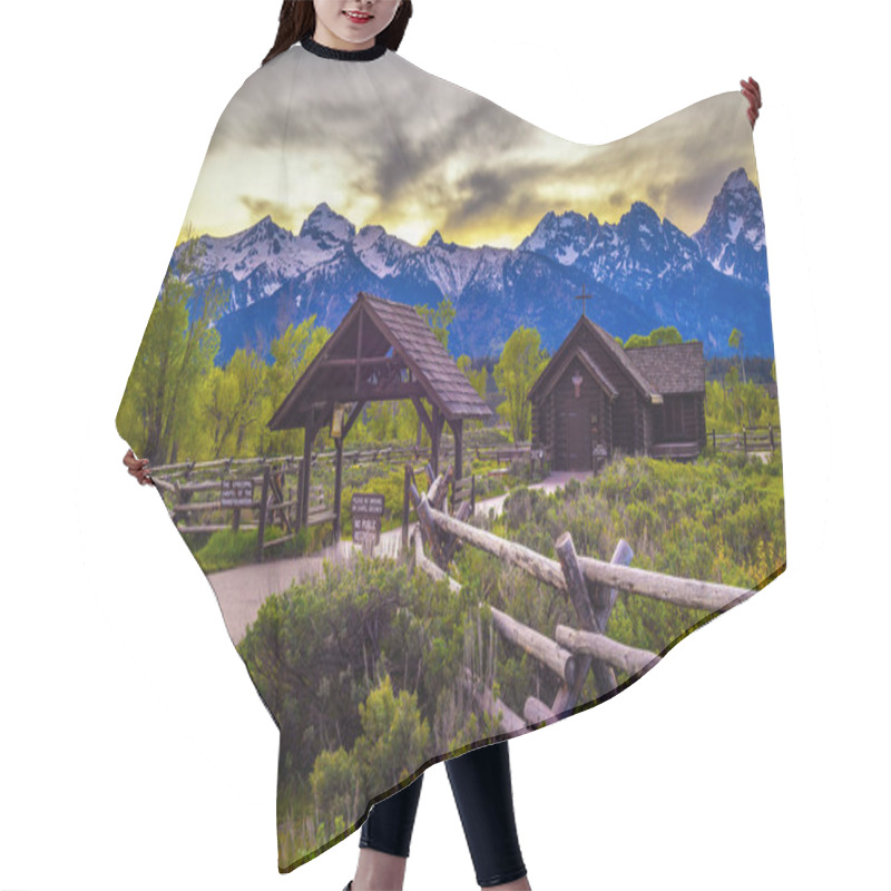 Personality  Chapel Of The Transfiguration In Grand Teton National Park, Wyoming, With Snowcapped Teton Mountain Range In The Background. Long Exposure. Hair Cutting Cape