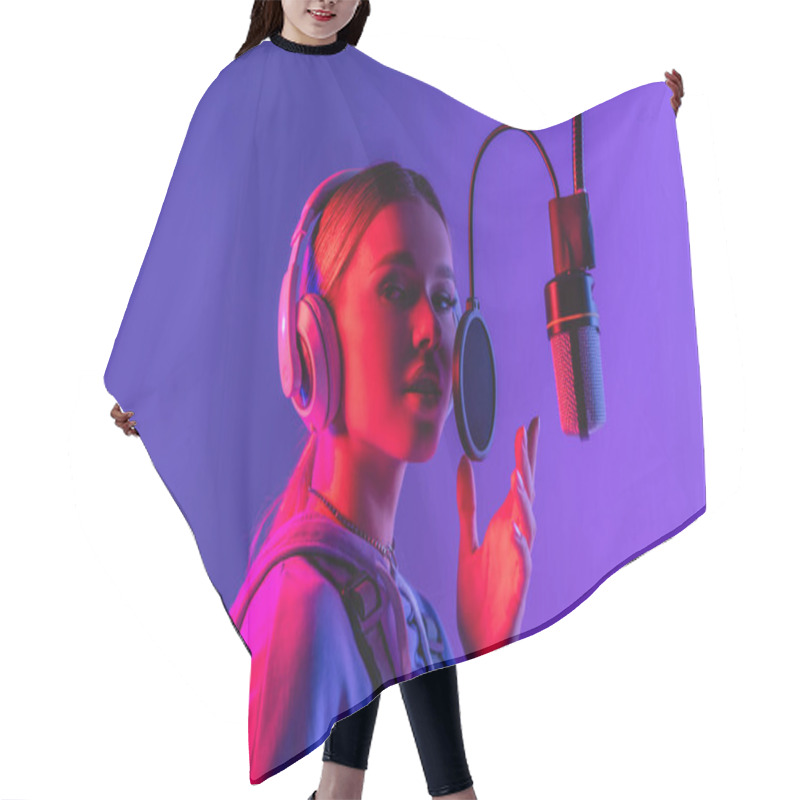 Personality  Young Singer In Wireless Headphones Singing Song In Microphone On Purple  Hair Cutting Cape