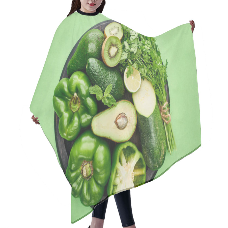 Personality  Top View Of Avocados, Peppers, Kiwi, Lime, Zucchini And Greenery On Pizza Skillet  Hair Cutting Cape