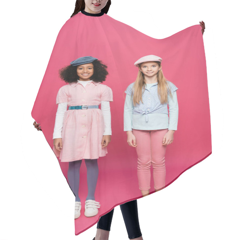 Personality  Full Length View Of Two Happy Interracial Girls In Trendy Clothes Posing On Pink Hair Cutting Cape