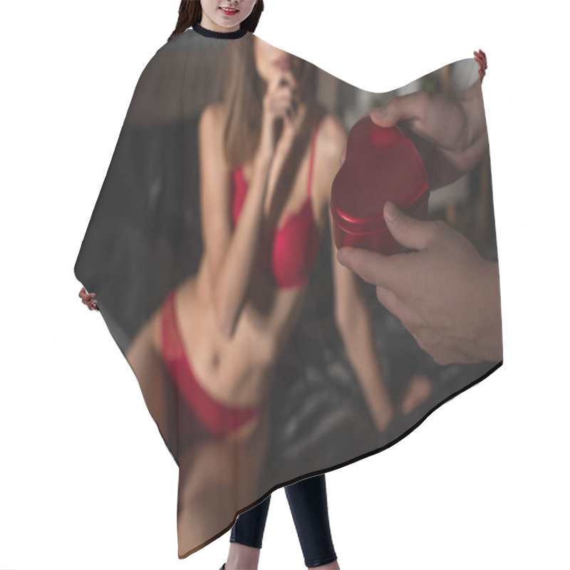 Personality  Cropped View Of Man Holding Valentines Day Present Near Blurred Woman In Red Sexy Lingerie Hair Cutting Cape