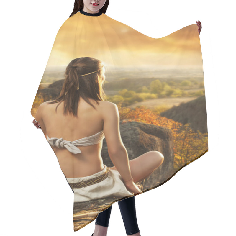 Personality  Primitive Woman Sitting On A Rock At The Sunset. Amazon Woman Hair Cutting Cape