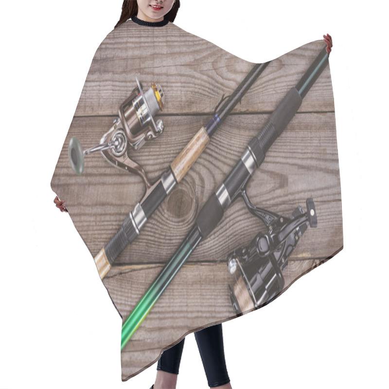 Personality  Top View Of Fishing Rods On Wooden Background, Minimalistic Concept  Hair Cutting Cape