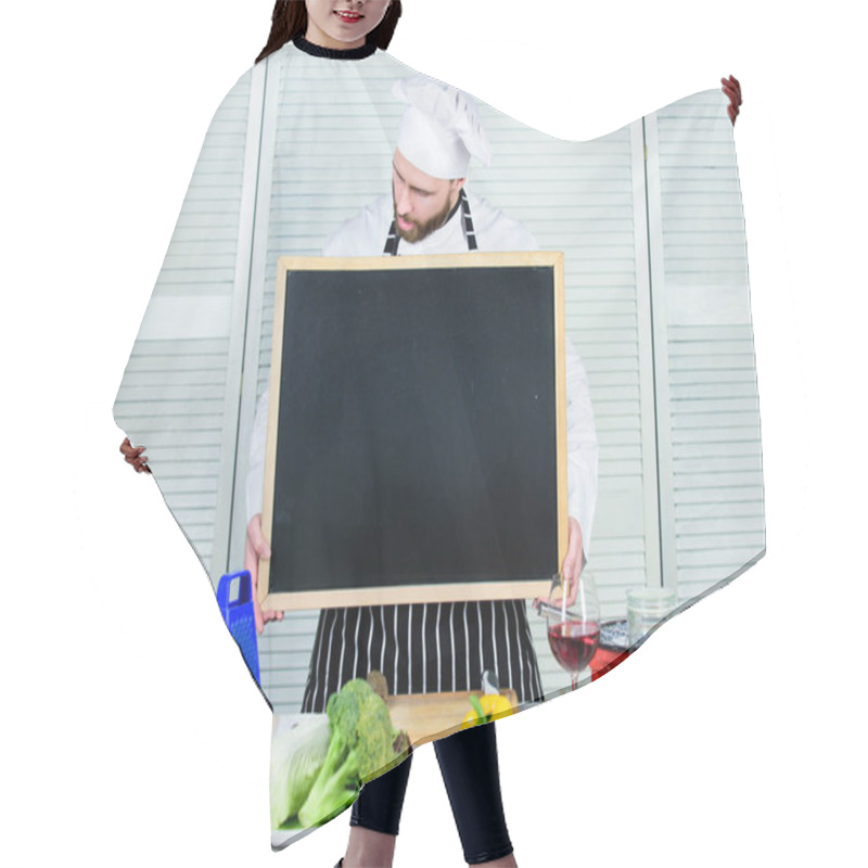 Personality  Education Of Cooking And Food Preparation. Chief Cook Teaching Master Class In Cooking School. Master Cook Giving Cooking Class. Man In Chef Hat Holding Empty Blackboard, Copy Space Hair Cutting Cape