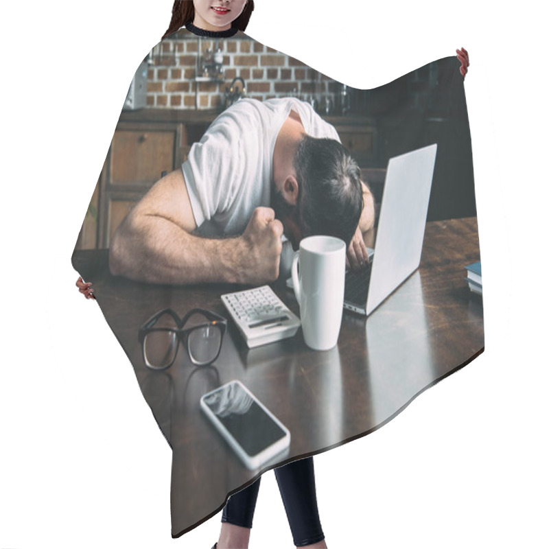 Personality  Tired Freelancer Remote Working Lying On Table With Laptop, Calculator And Cup Of Coffee In Kitchen At Home Hair Cutting Cape