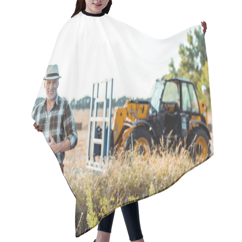 Personality  Happy Senior Farmer Showing Thumb Up Near Tractor  Hair Cutting Cape