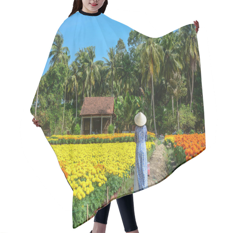 Personality  A Vietnamese Woman In Traditional Dress (Ao Dai) Walking On Rural Road With Flower Field. Hair Cutting Cape