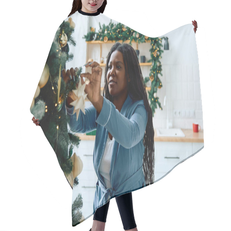 Personality  Beautiful Woman Hangs A Star On A Beautifully Decorated Christmas Tree. Hair Cutting Cape