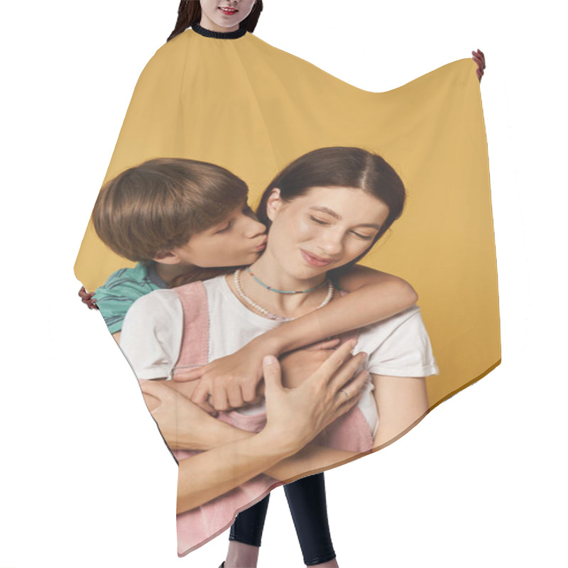 Personality  A Young Mother Embraces Her Son, Who Kisses Her Cheek In A Joyful Display Of Affection. Hair Cutting Cape