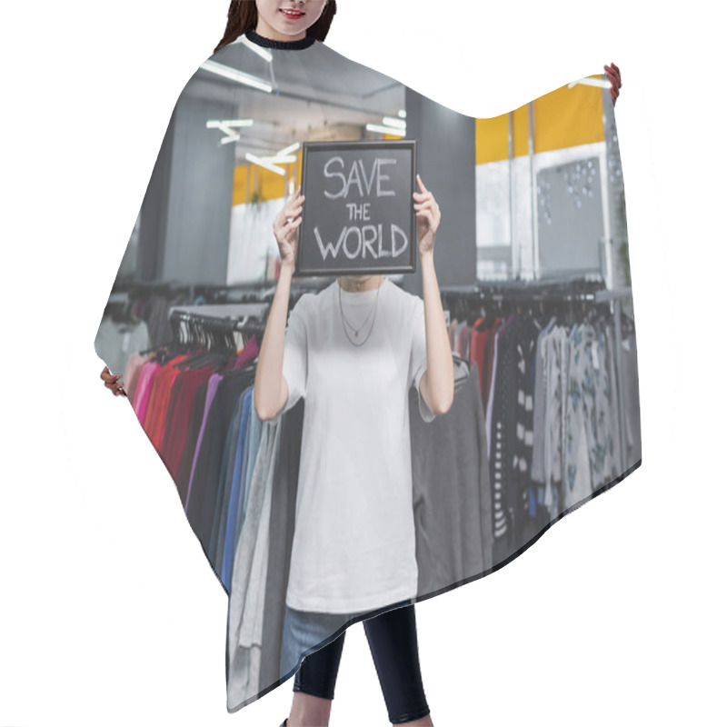 Personality  Retailer Holding Board With Save The World Lettering In Second Hand  Hair Cutting Cape