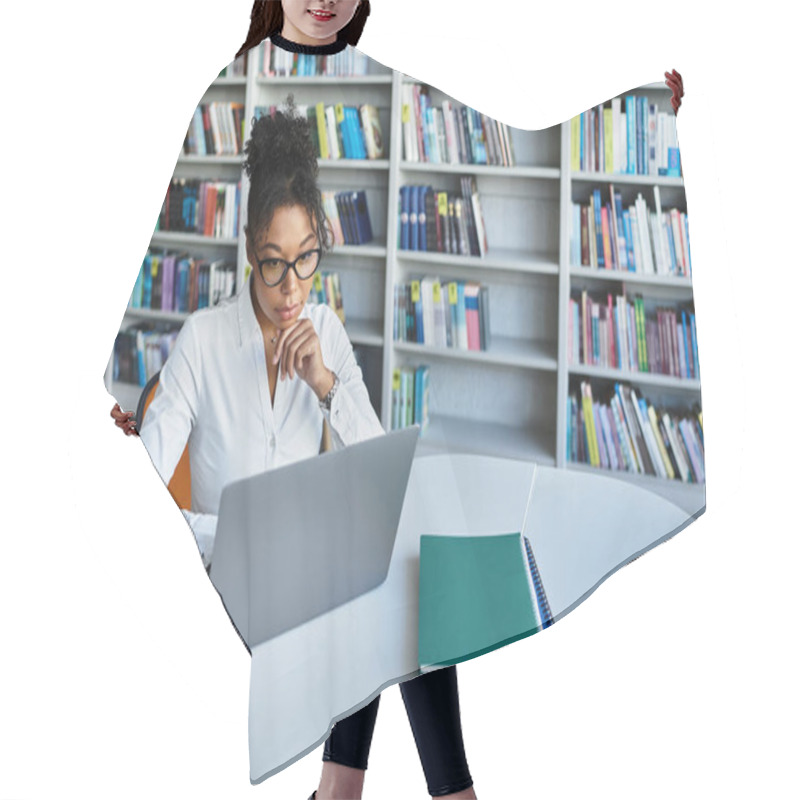 Personality  A Dedicated African American Teacher Thoughtfully Prepares Lessons At Her Desk Surrounded By Books. Hair Cutting Cape