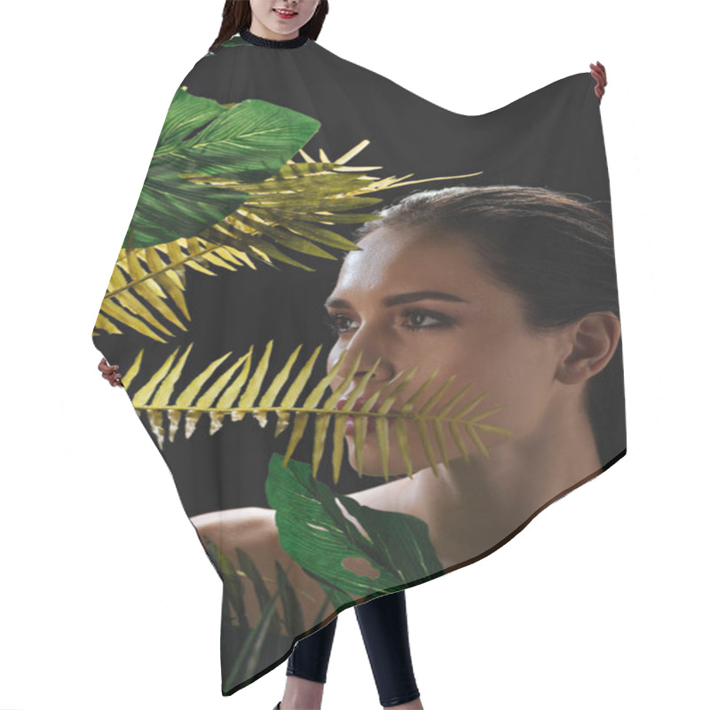 Personality  Attractive Girl Looking Away Behind Green Leaves Isolated On Black Hair Cutting Cape