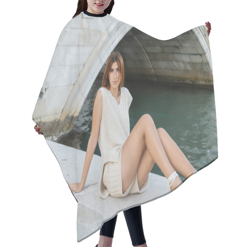 Personality  Full Length Of Young Woman In Summer Knitwear And Wedge Sandals Sitting Near Canal In Venice Hair Cutting Cape