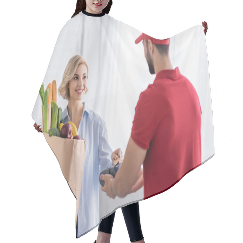 Personality  Arabian Delivery Man Holding Terminal Near Blonde Woman With Fresh Food In Paper Bag Hair Cutting Cape