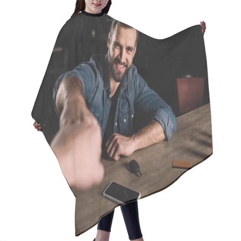 Personality  Cropped Image Of Visitor And Bartender Bumping Fists At Bar Counter Hair Cutting Cape