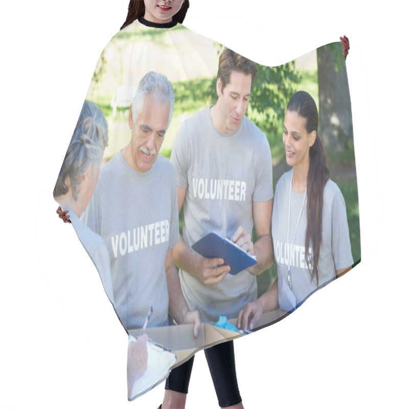 Personality  Happy Volunteer Writing On Clipboard Hair Cutting Cape