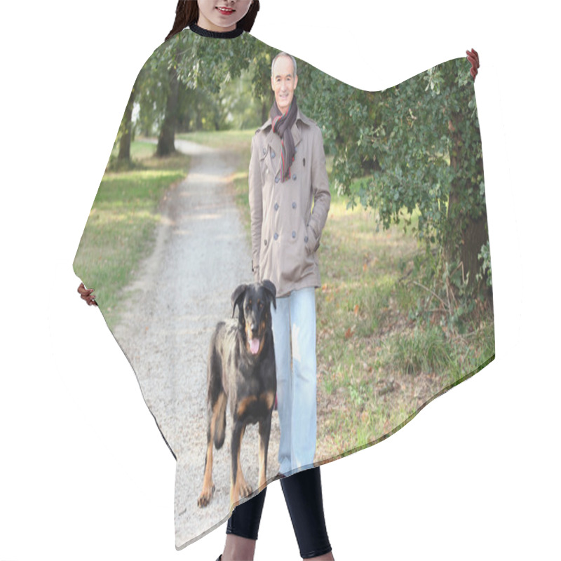 Personality  Senior Man Walking His Dog In The Woods Hair Cutting Cape