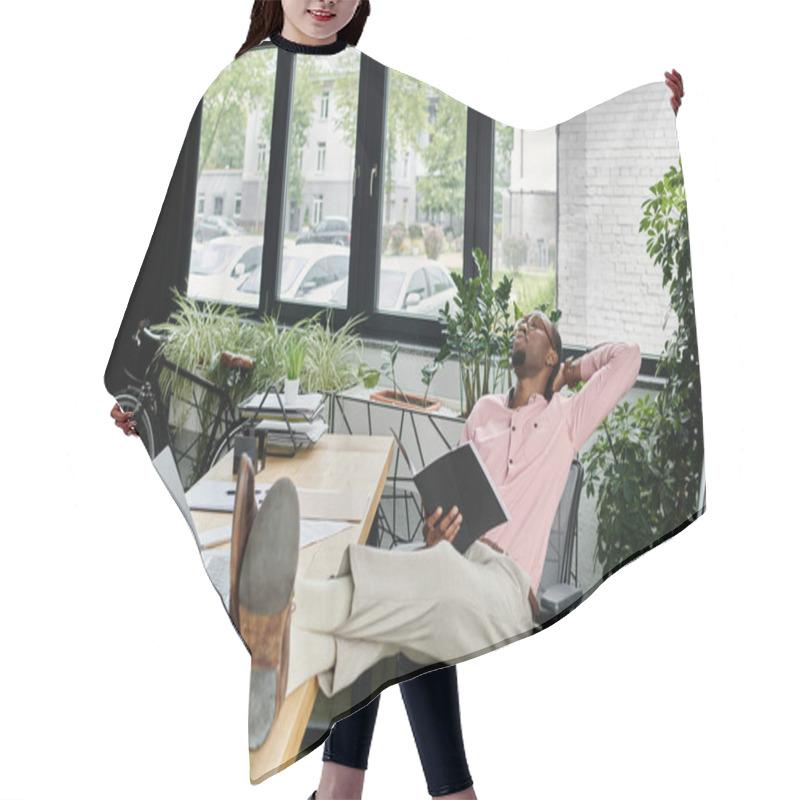 Personality  Relaxing In A Modern Office, A Young Man Takes A Moment To Unwind During His Remote Workday. Hair Cutting Cape