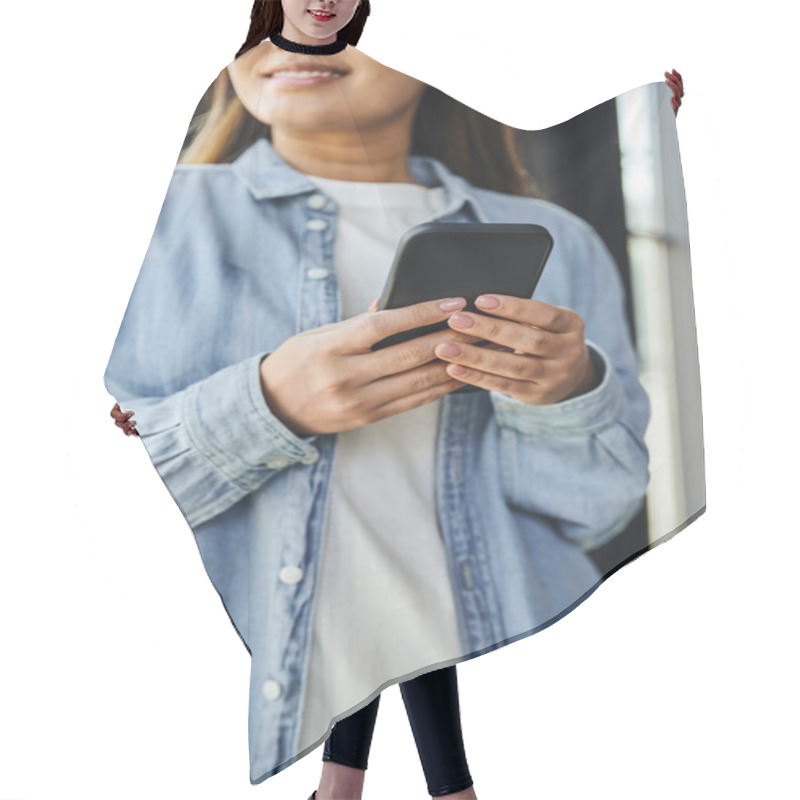 Personality  Cropped View Of Smiling Businesswoman In Blue Denim Shirt Networking On Mobile Phone While Standing In Contemporary Office On Blurred Background, Young Entrepreneur, Successful Youth Hair Cutting Cape