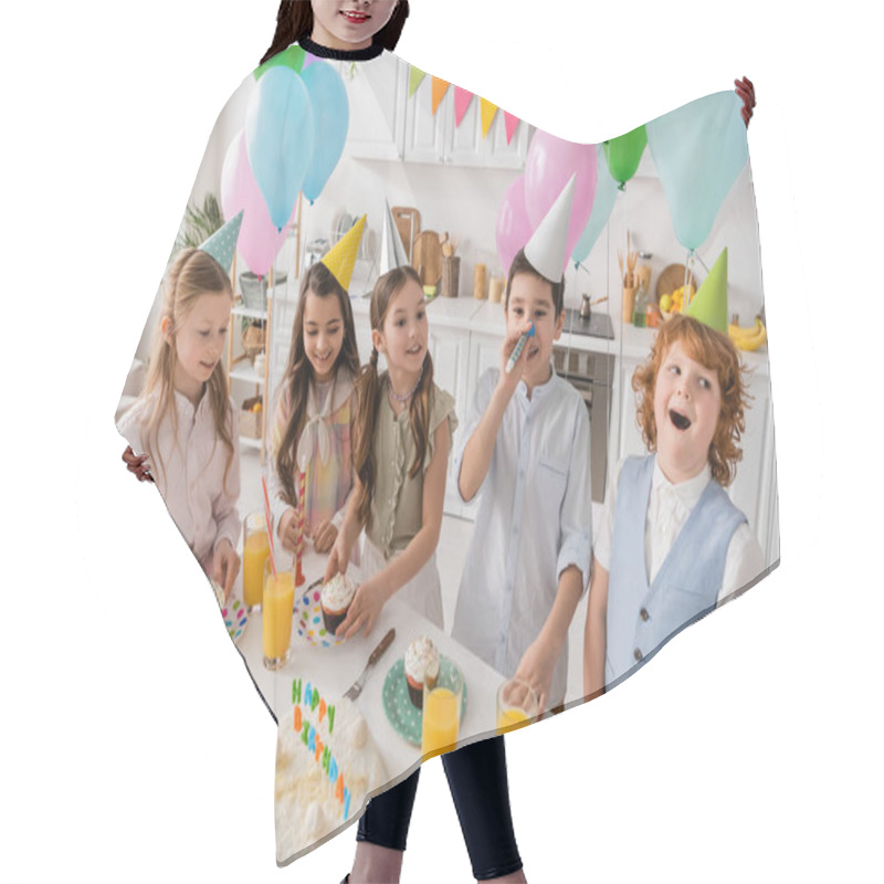 Personality  Happy Preteen Girls Holding Cupcakes And Looking At Boys During Birthday Party  Hair Cutting Cape