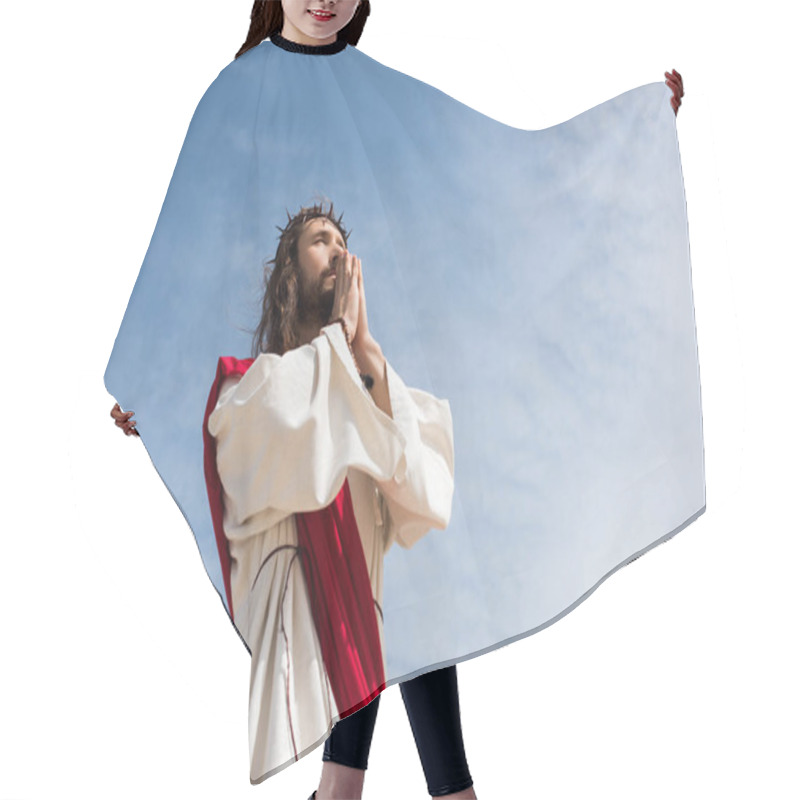 Personality  Low Angle View Of Jesus Praying Against Blue Sky Hair Cutting Cape