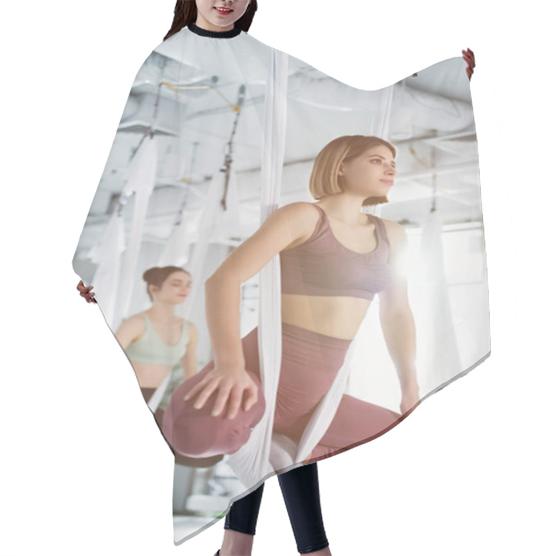 Personality  Young Sportive Women Practicing Yoga Pose In Fly Yoga Hammocks, Blurred Background Hair Cutting Cape