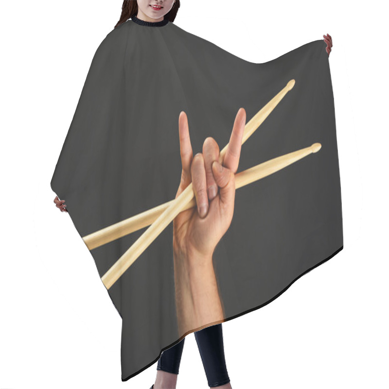 Personality  Man Hand With Crossed Drumsticks And Devil Horns Over Black Hair Cutting Cape