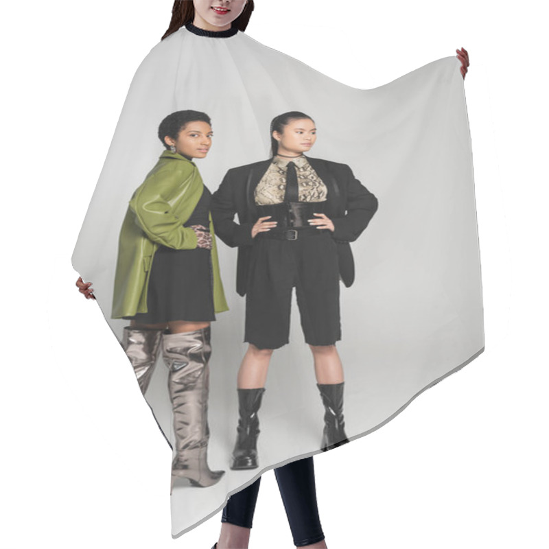 Personality  Stylish African American Woman Posing Near Asian Friend In Jacket On Grey Background Hair Cutting Cape