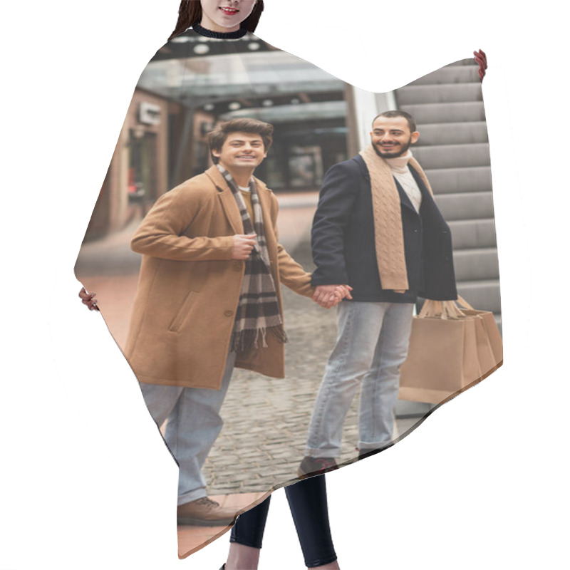 Personality  Gay Man In Beige Coat And Plaid Scarf Holding Hands With Smiling Bearded Boyfriend With Shopping Bags Near Escalator Hair Cutting Cape