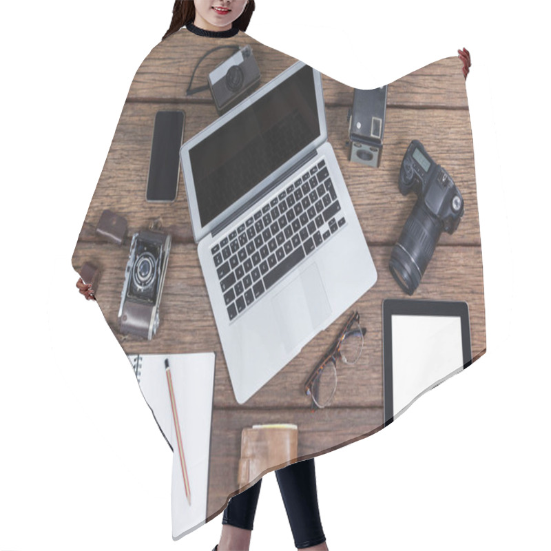 Personality  Close-up Of Laptop With Cameras On Table Hair Cutting Cape