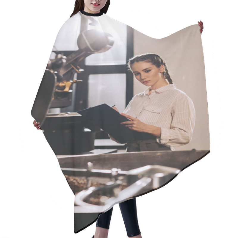 Personality  Portrait Of Focused Coffee Roaster With Notepad Checking Work  Hair Cutting Cape