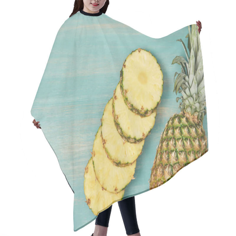 Personality  Top View Of Sliced Juicy Circles Near Whole Pineapple On Turquoise Wooden Table Hair Cutting Cape