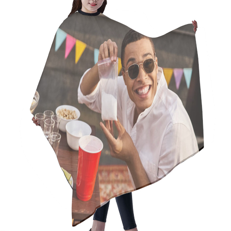 Personality  Joyous Young African American Man Holding Bag Of Salt Before Drinking Tequila And Smiling At Camera Hair Cutting Cape